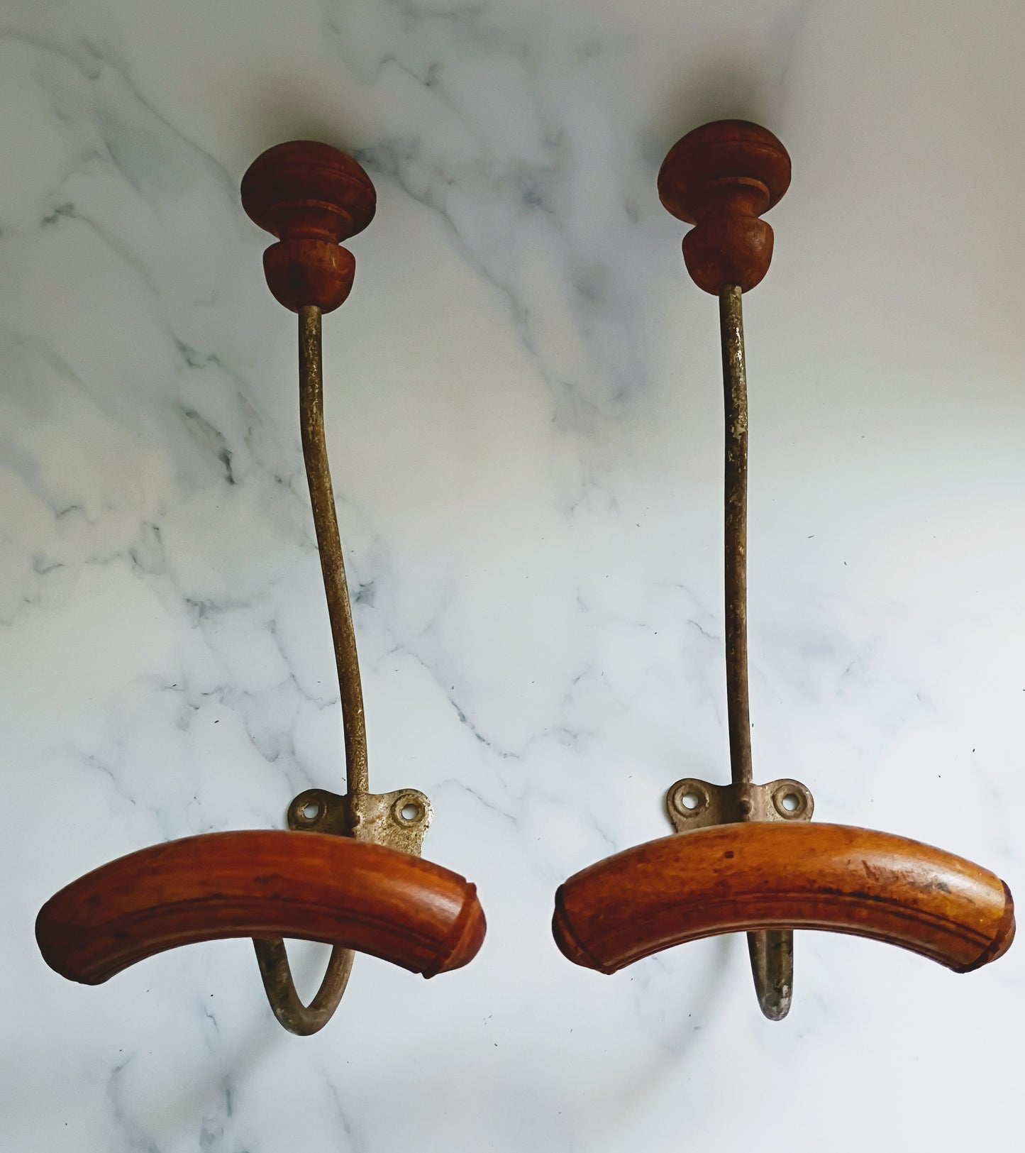 Pair of Antique French Cast Iron & Wood Coat Hooks